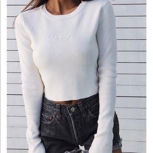 Off white colored cropped knit sweater